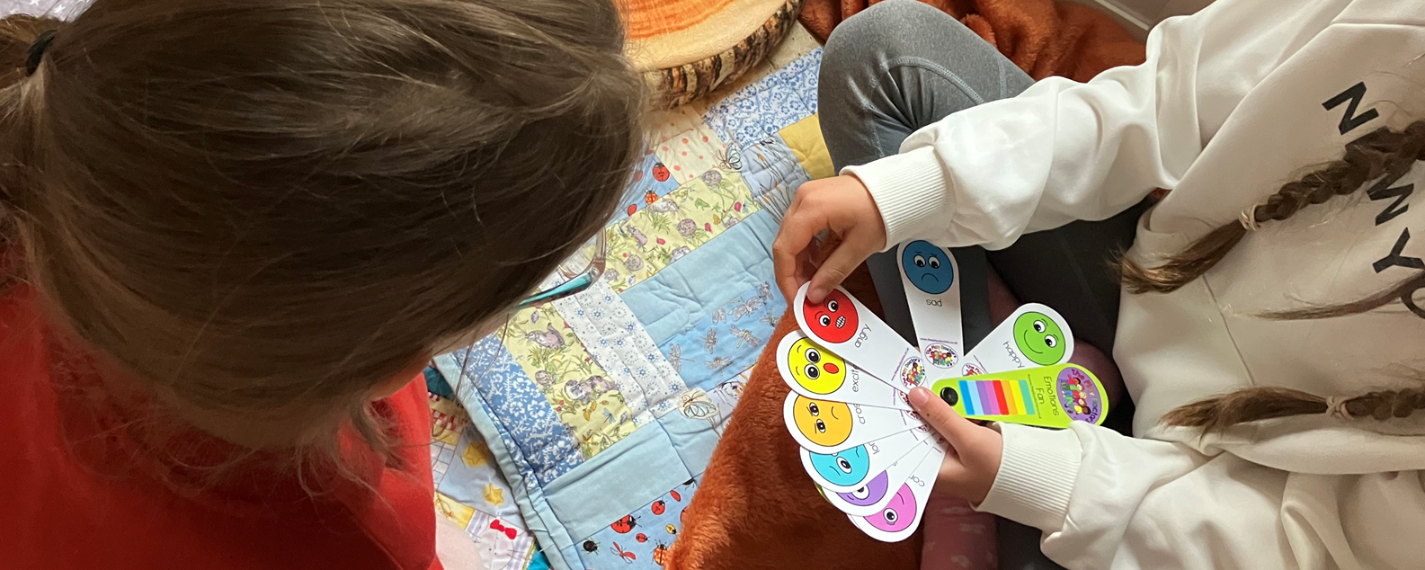 children playing with emotion recognition resources